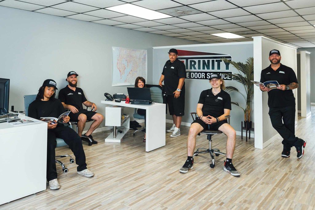 The Trinity Garage Door team in their Tampa Bay showroom
